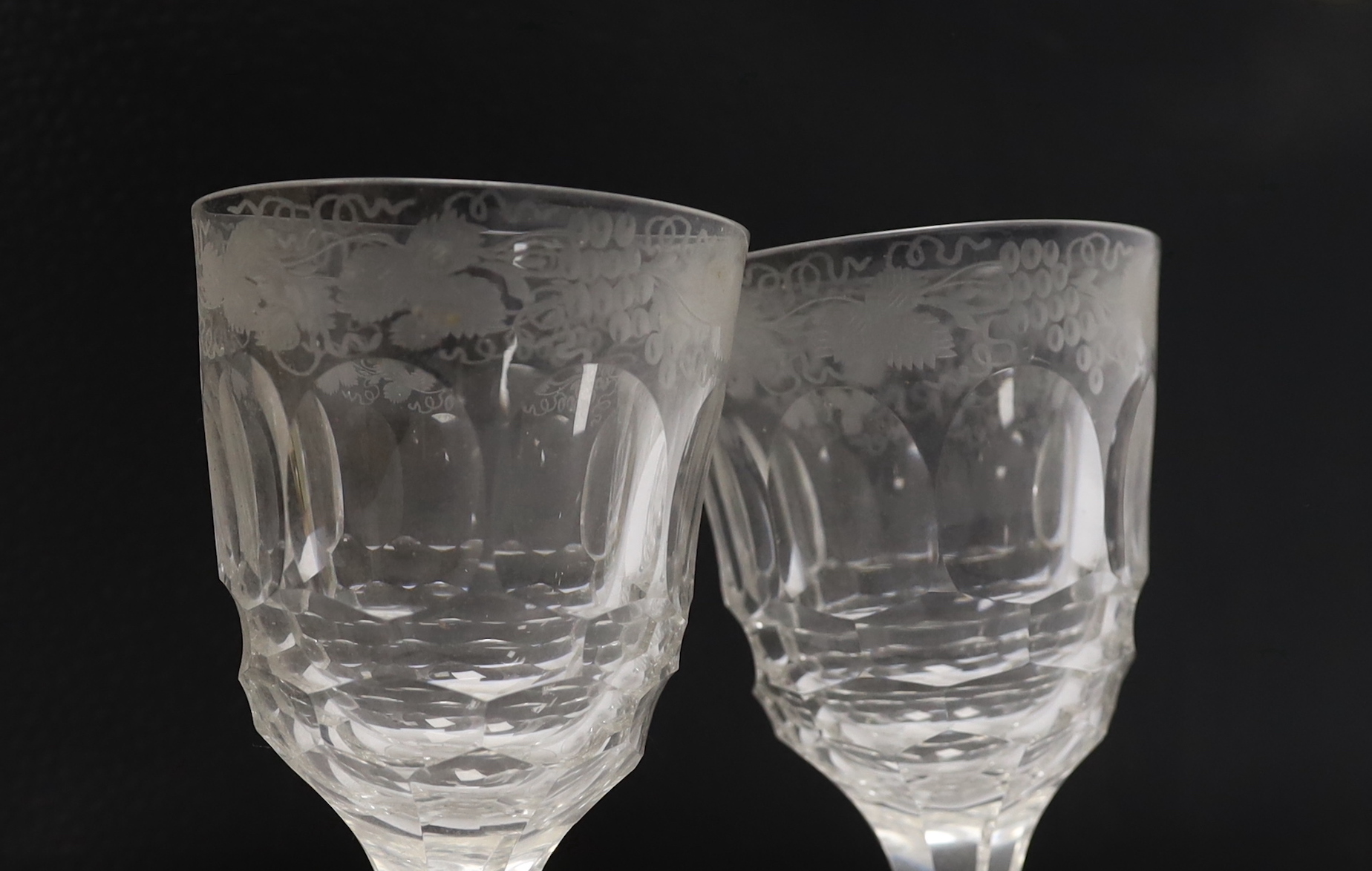 A pair of unusual Bohemian wheel engraved glass roemers with applied red and green glass prunts, possibly Moser and two vine engraved rummers, tallest 17cm